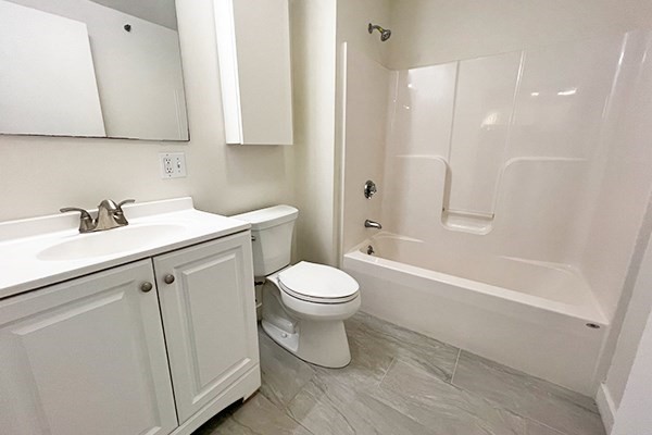 45 High Street, Unit 4 North Andover, MA 01845 - Photo 6 of 17 a bathroom with a sink a toilet and shower