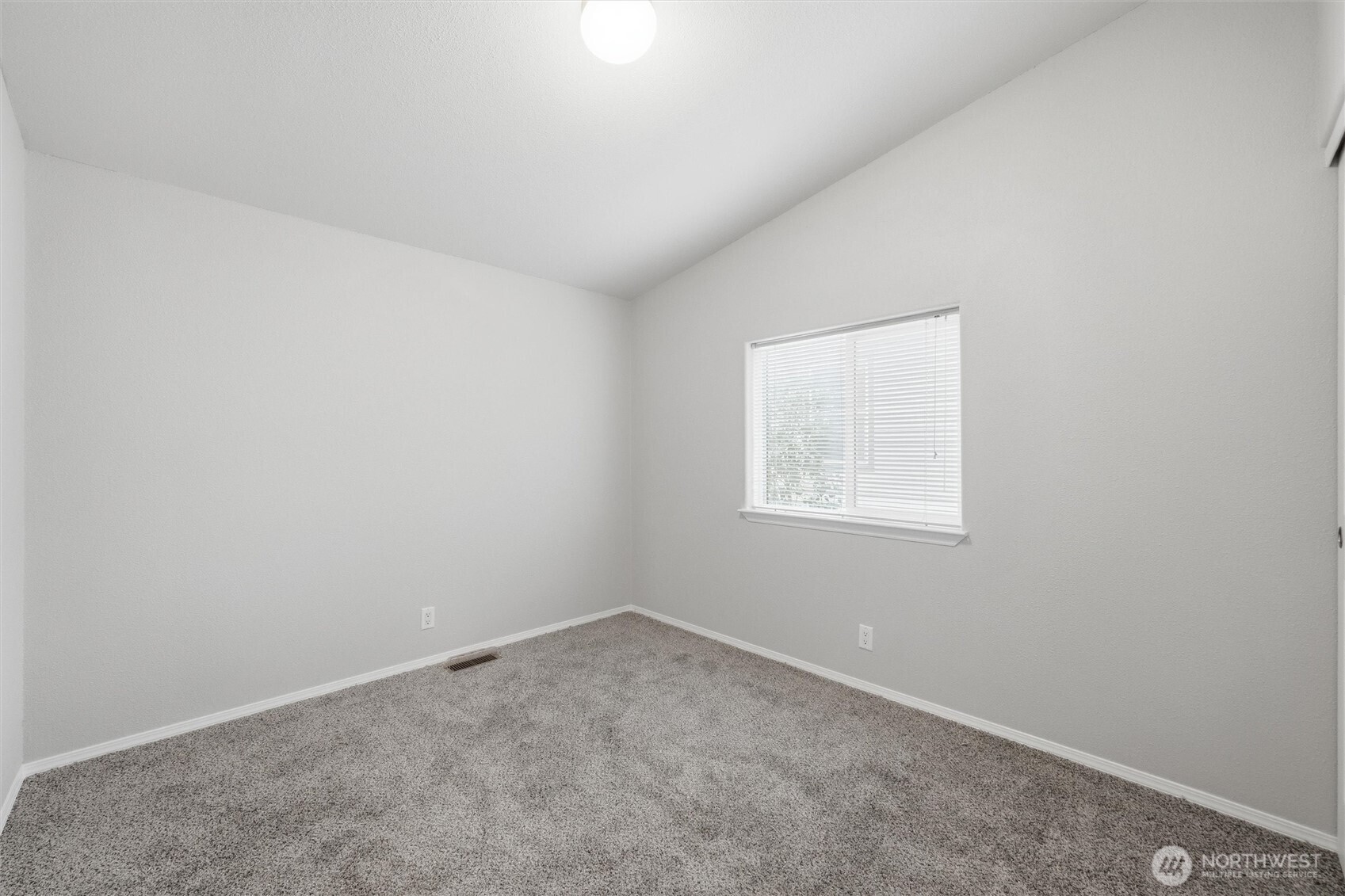 107 South Pass Road, Unit 23 Nooksack, WA 98276 - Photo 14 of 23 an empty room with a window