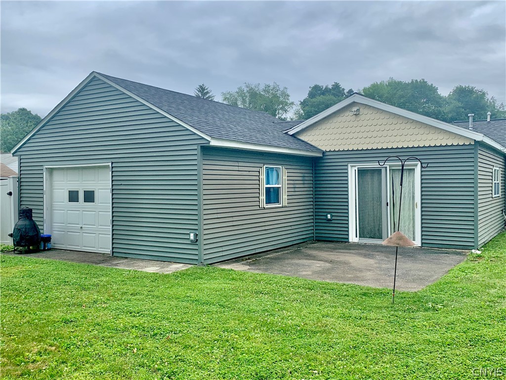 53 Pinecrest Road Whitestown, NY 13492 - Photo 31 of 33 Overhead garage door to rear yard. Width of garage