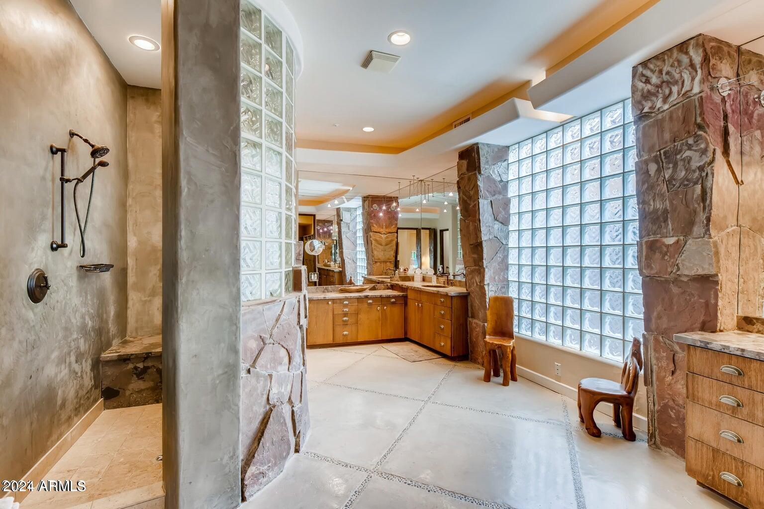 7475 East Gainey Ranch Road, Unit 26 Scottsdale, AZ 85258 - Photo 11 of 25 Primary Bathroom with Separate Closets