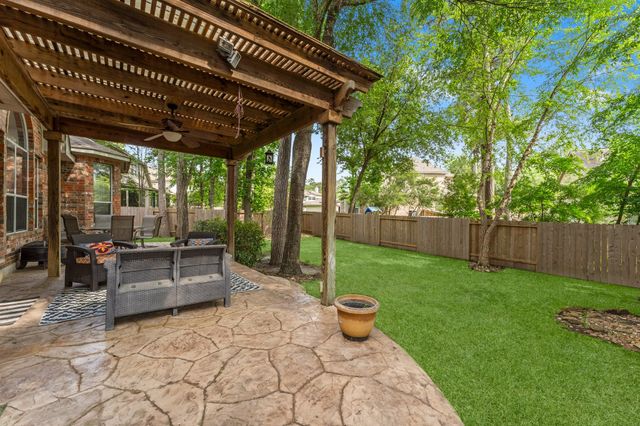 a view of yard with patio