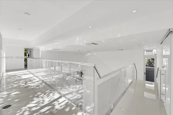 a view of a hallway with a furniture