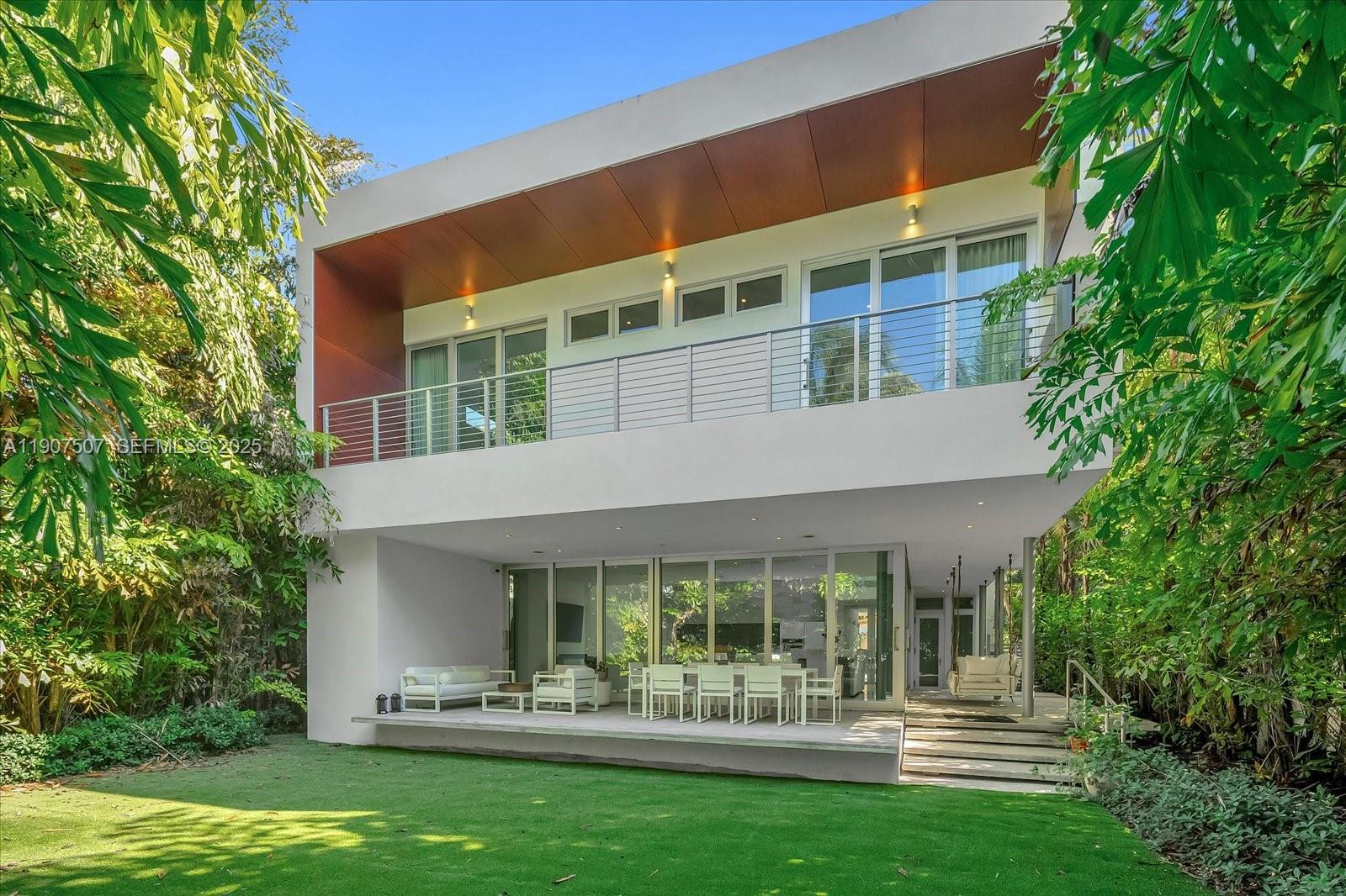 7830 Atlantic Way Miami Beach, FL 33141 - Photo 27 of 34 front view of house with a yard