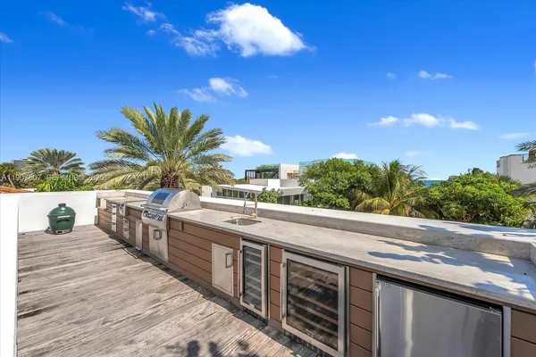 a balcony with furniture and outdoor view