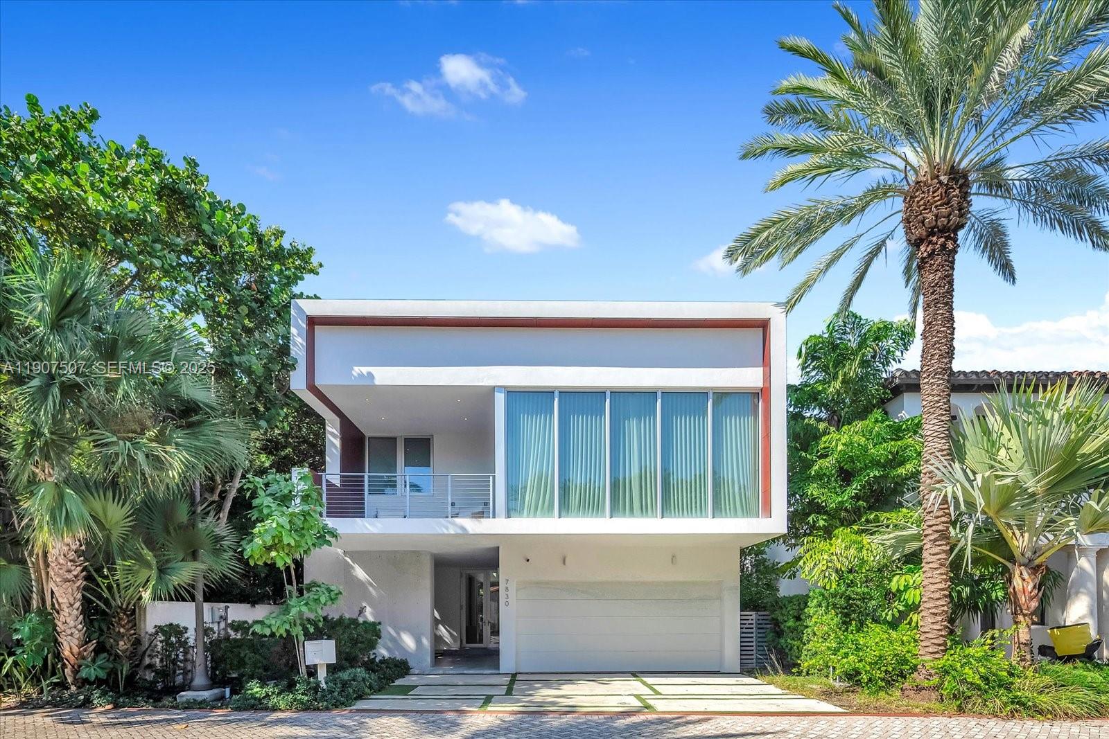 7830 Atlantic Way Miami Beach, FL 33141 - Photo 3 of 34 a view of a house with a patio
