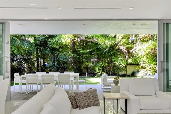 a outdoor living space with furniture and a garden