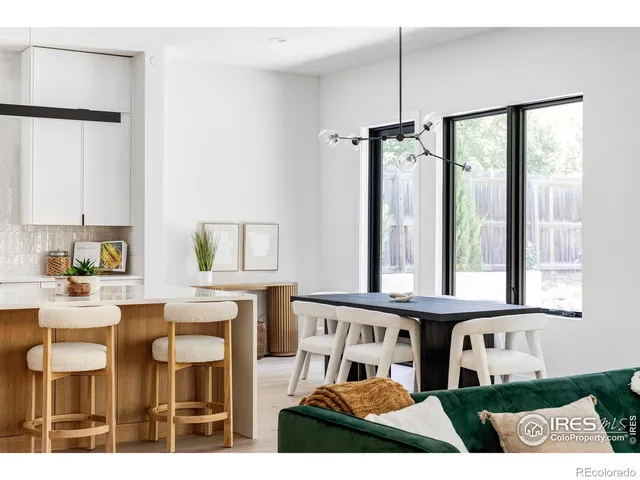 a kitchen view of counter top space and windows