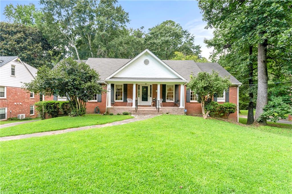 616 Park Lane Decatur, GA 30033 - Photo 1 of 1 a front view of a house with a yard