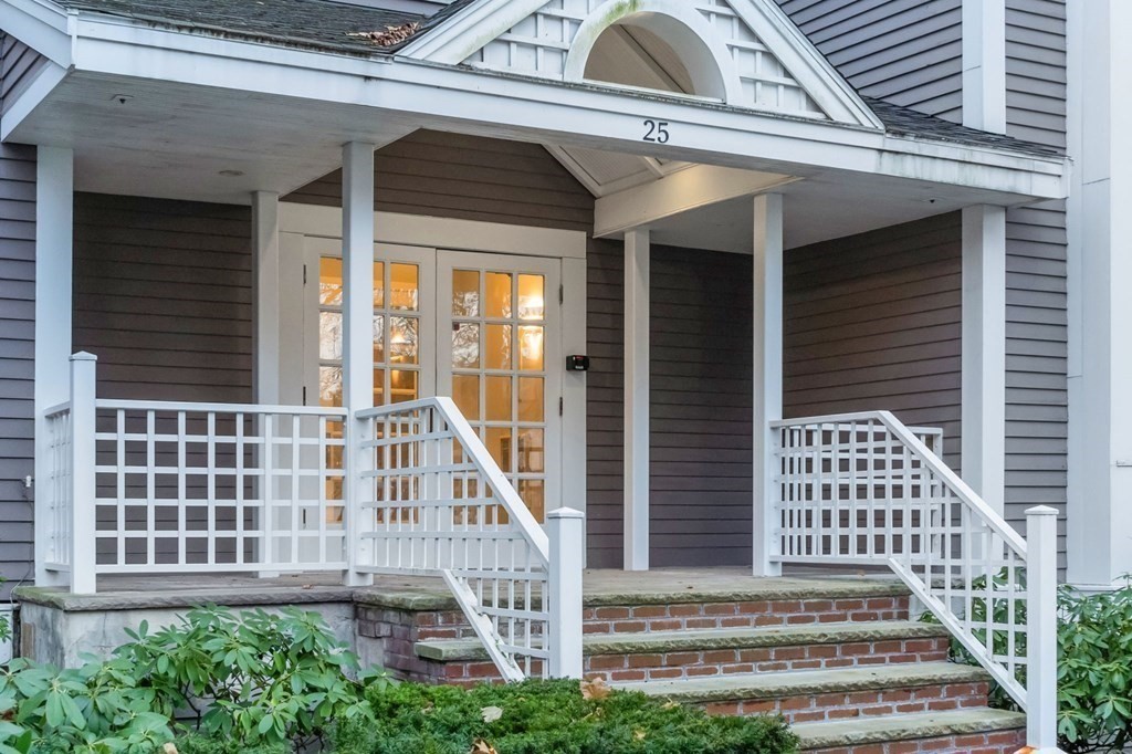 25 Holly Lane, Unit 2A Brookline, MA 02467 - Photo 8 of 34 a front view of a house with a porch