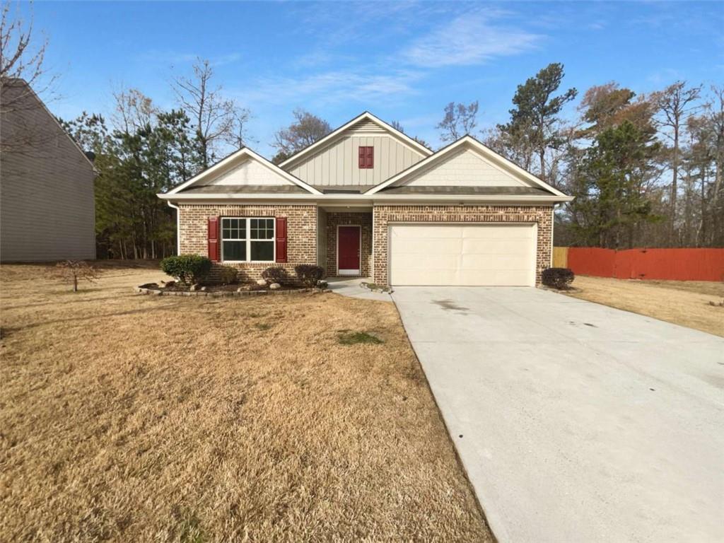 a front view of a house with yard