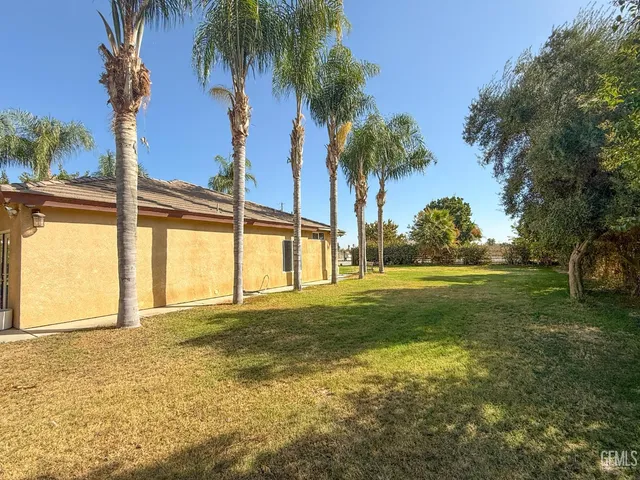 a view of road with a building in the background