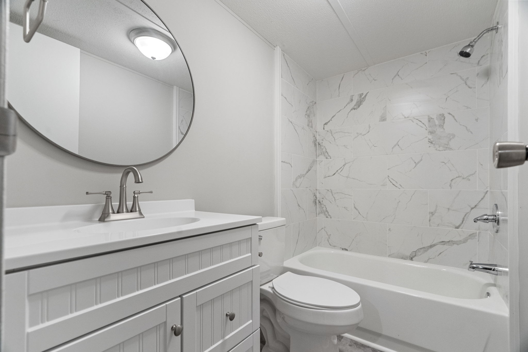 4147 Fizer Road Springfield, TN 37172 - Photo 17 of 25 a bathroom with a sink a toilet and a mirror