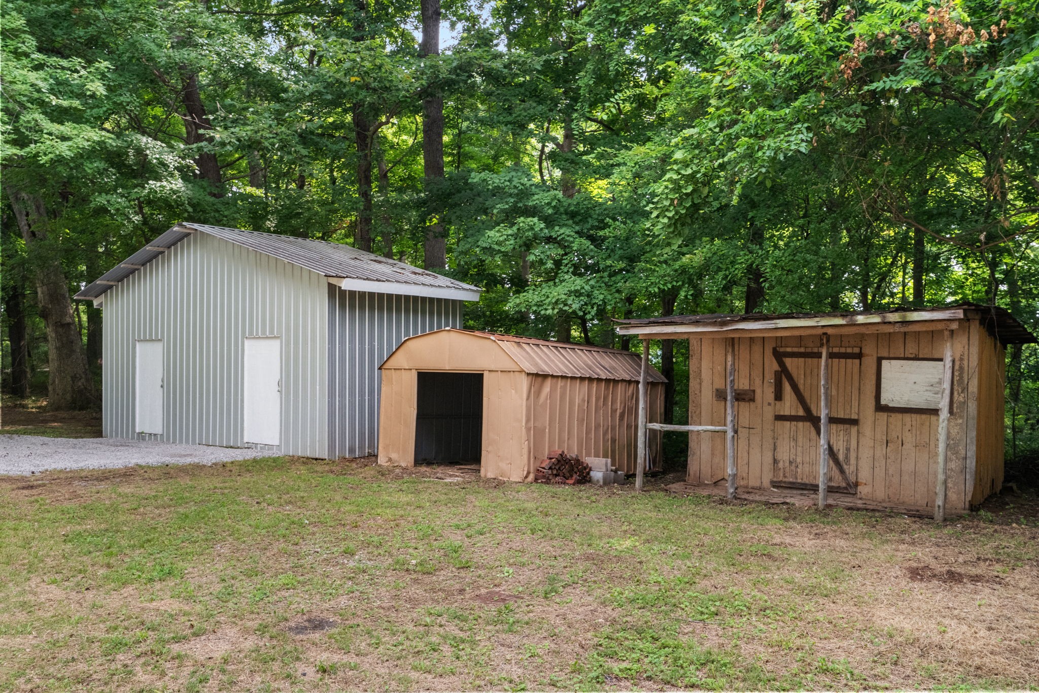 4147 Fizer Road Springfield, TN 37172 - Photo 21 of 25 a front view of house with backyard and trees