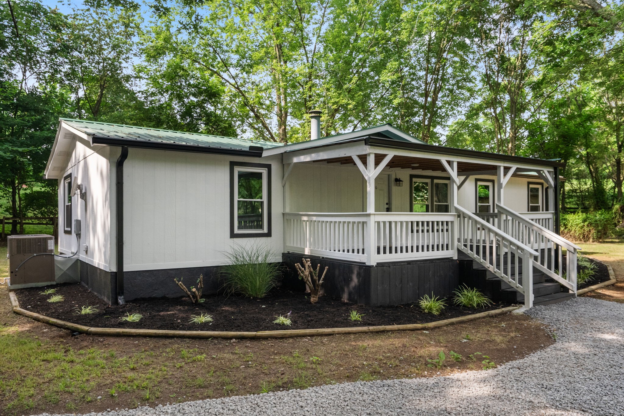 4147 Fizer Road Springfield, TN 37172 - Photo 3 of 25 a view of a house with a yard and plants