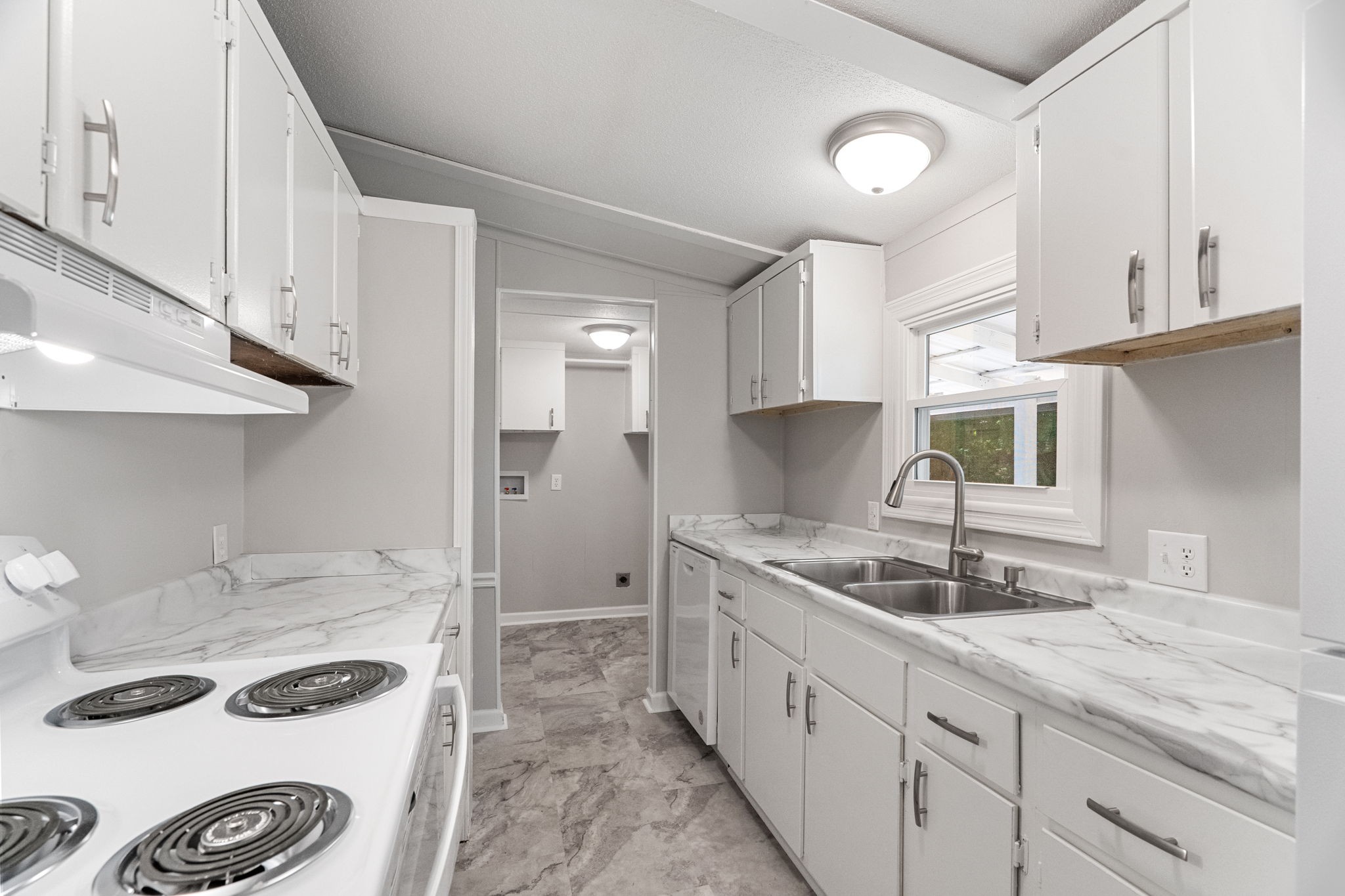 4147 Fizer Road Springfield, TN 37172 - Photo 9 of 25 a kitchen with a sink and cabinets