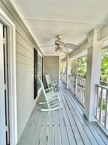 a view of outdoor space with wooden floor and deck