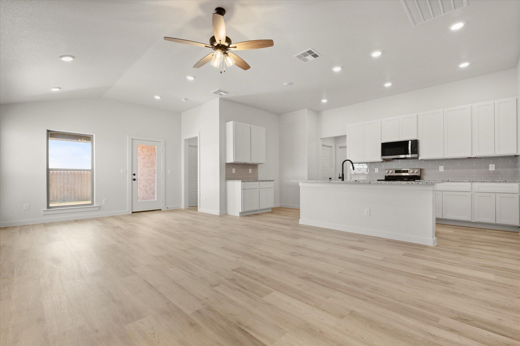 5631 Rice Street Lubbock, TX 79416 - Photo 4 of 25 07-5631 Rice_9593