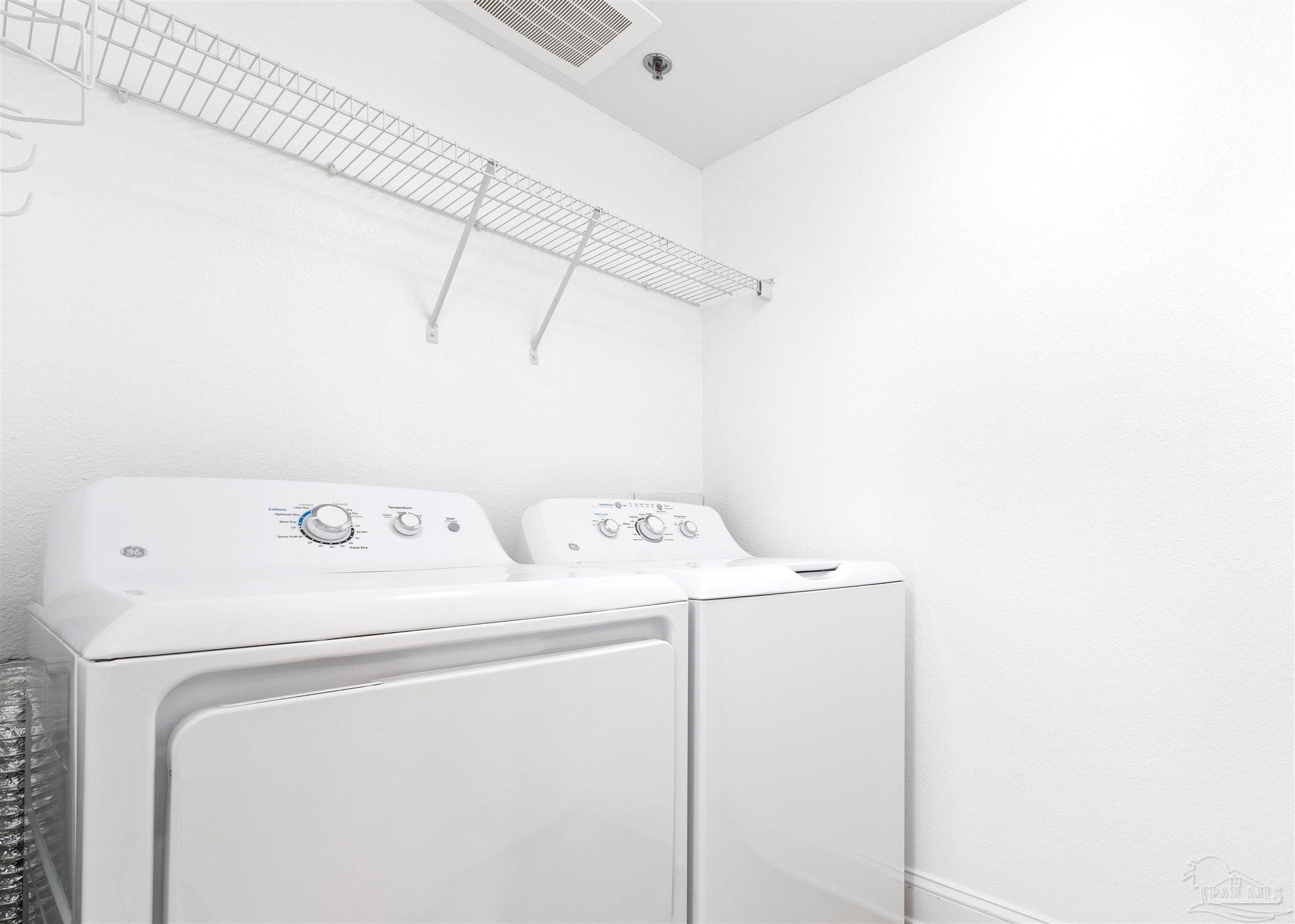 850 Fort Pickens Road, Unit 1040 Pensacola Beach, FL 32561 - Photo 37 of 37 a utility room with dryer and washer