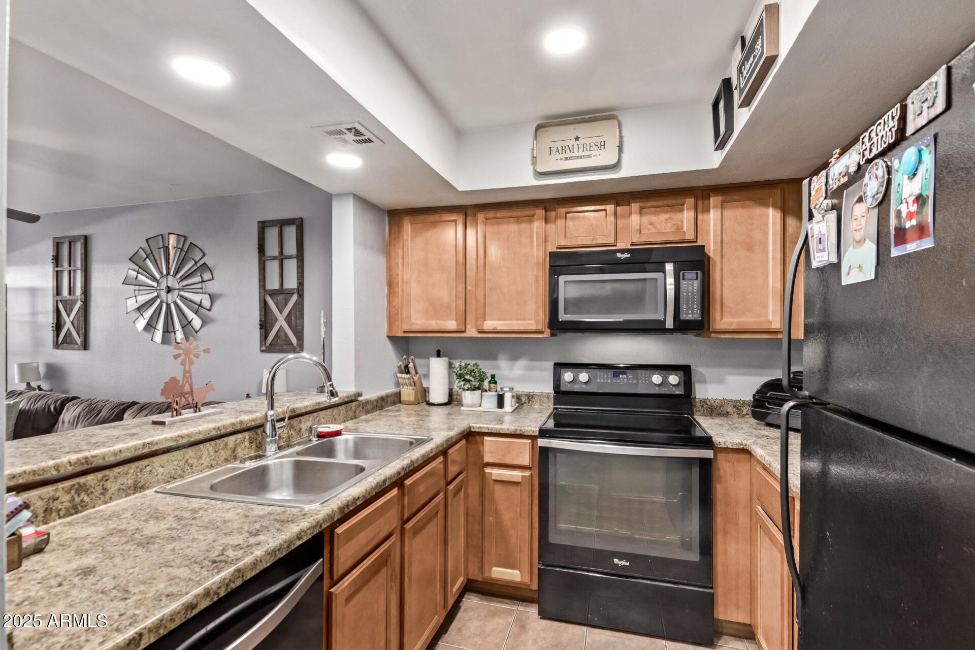 1331 West Baseline Road, Unit 153 Mesa, AZ 85202 - Photo 2 of 25 a kitchen with a sink stove and microwave