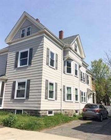 12 Union Street Beverly, MA 01915 - Photo 19 of 19 a front view of a house with a yard