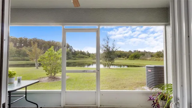 a view of a lake from a window