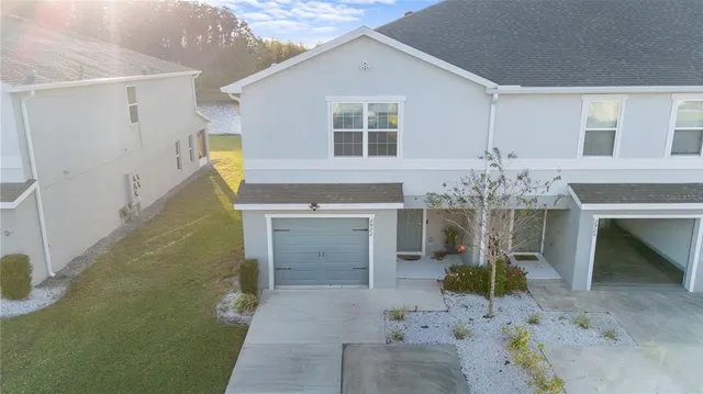 a very nice looking dining room with a fireplace