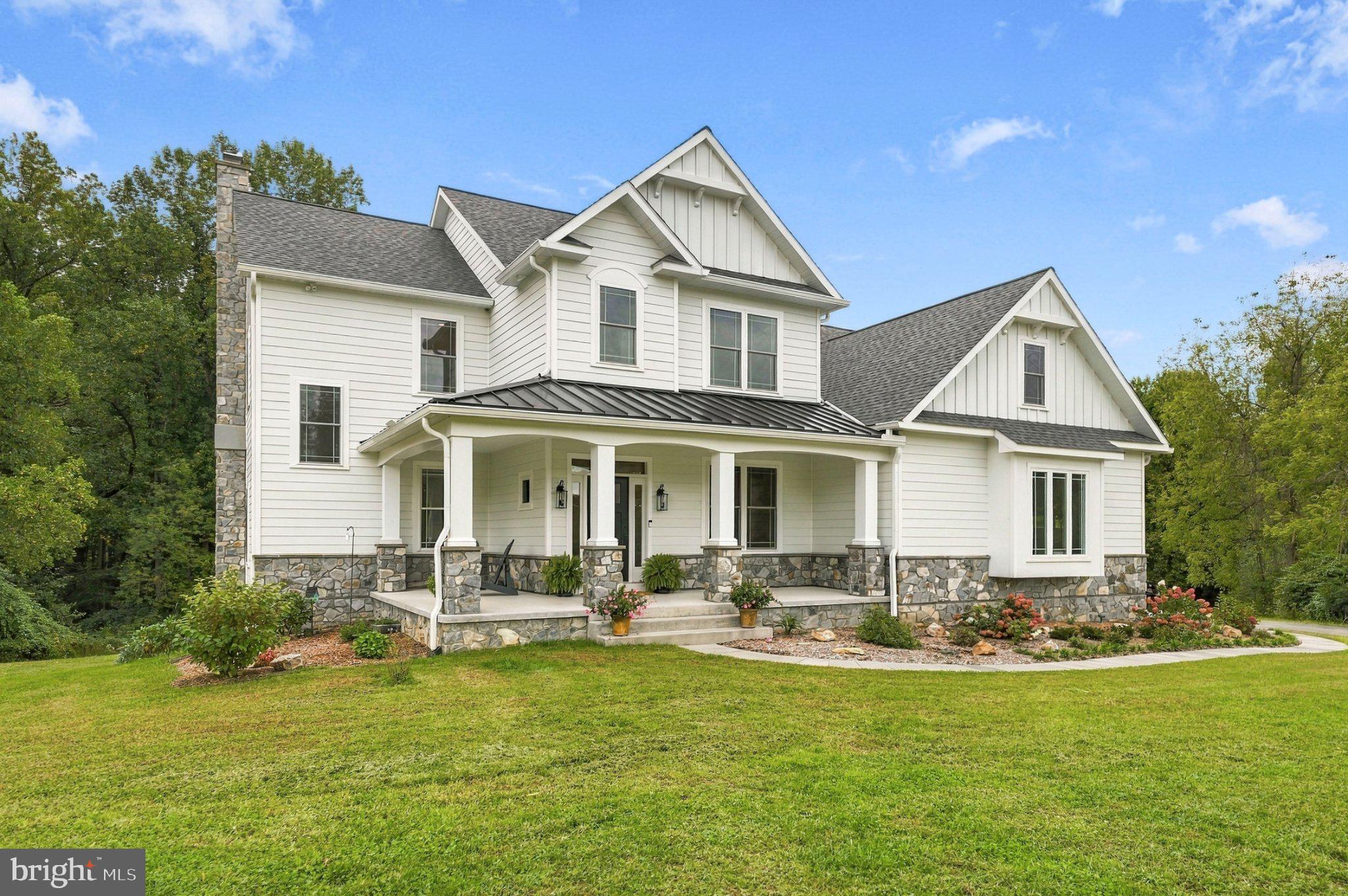 Exterior Front-Hardi Plank Siding with Real Stone
