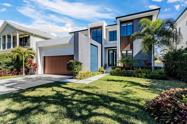 a view of house with yard and outdoor space