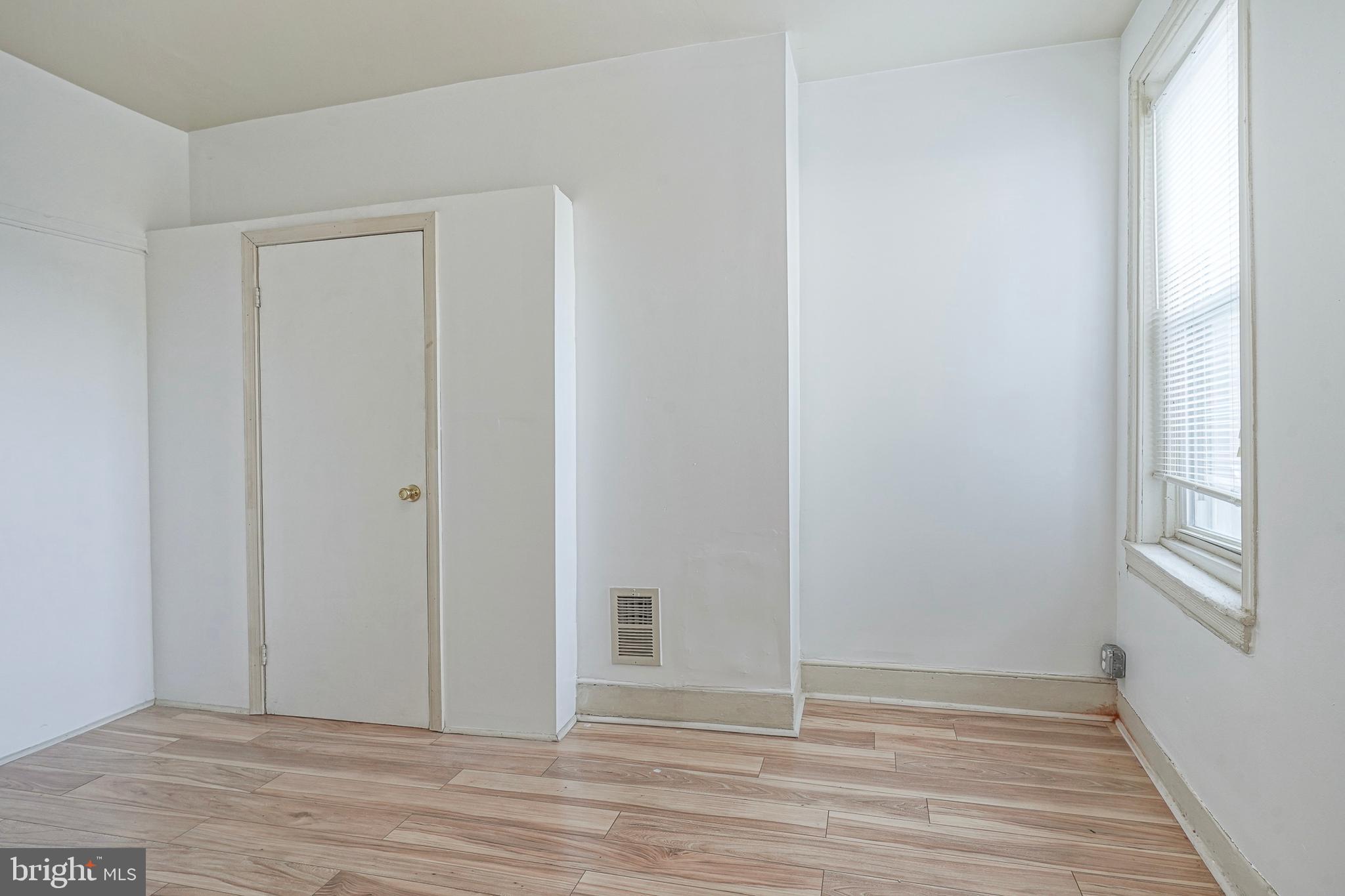 1904 Federal Street Philadelphia, PA 19146 - Photo 17 of 22 a view of an empty room with wooden floor