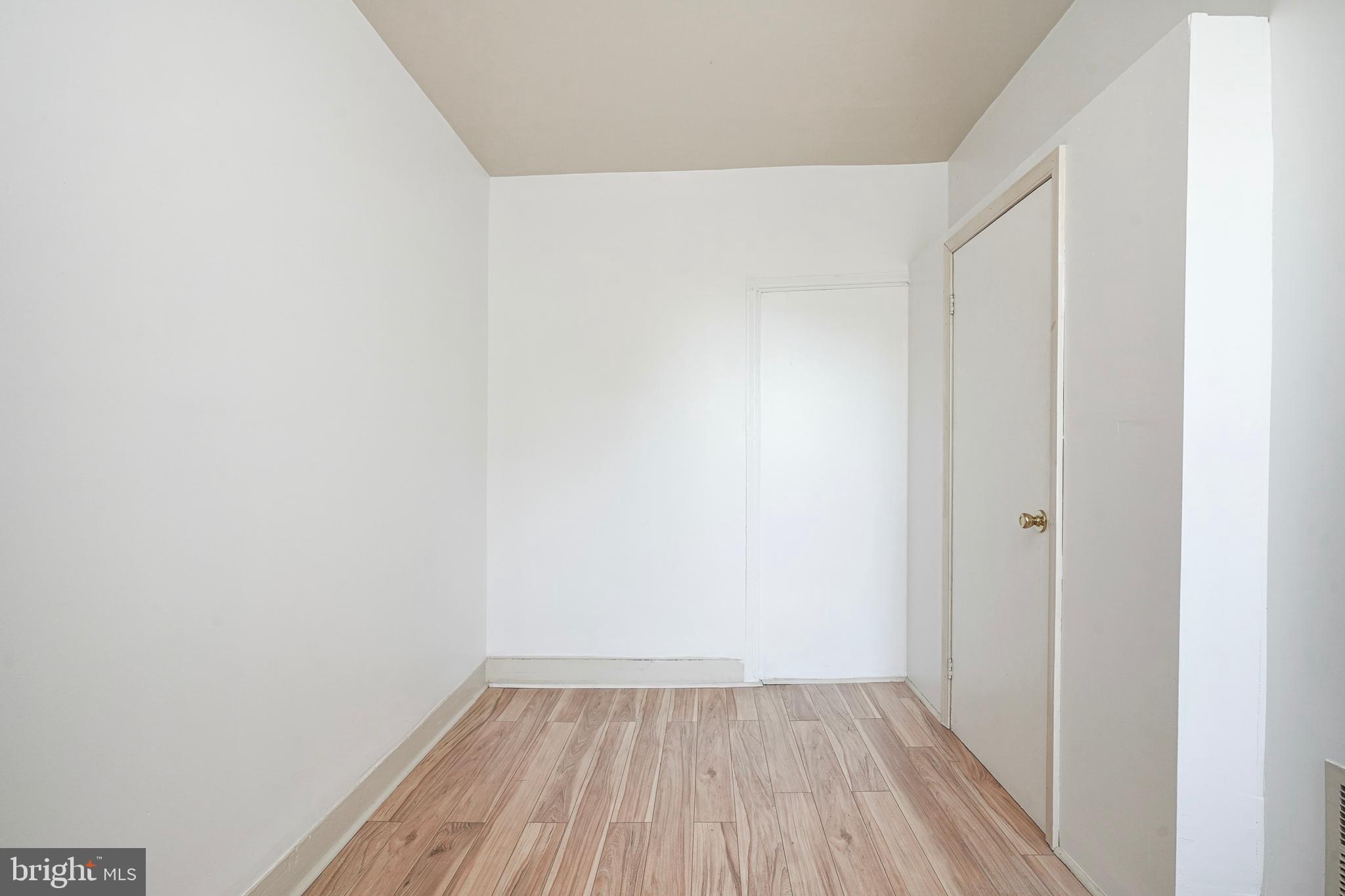 1904 Federal Street Philadelphia, PA 19146 - Photo 18 of 22 a view of a small space with wooden floor and a window