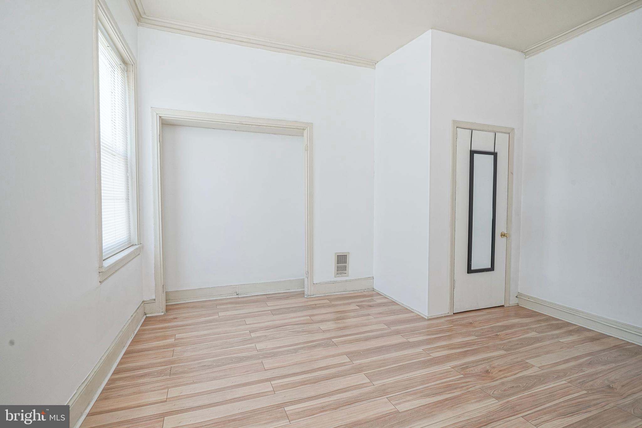 1904 Federal Street Philadelphia, PA 19146 - Photo 20 of 22 a view of a room with wooden floor and closet