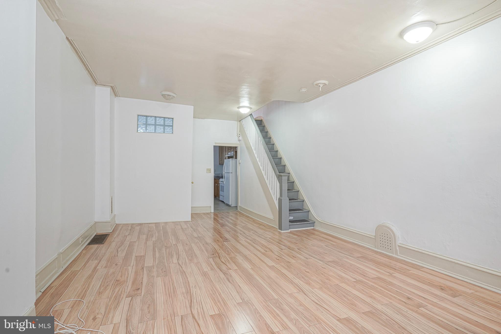 1904 Federal Street Philadelphia, PA 19146 - Photo 3 of 22 a view of hallway with stairs and wooden floor
