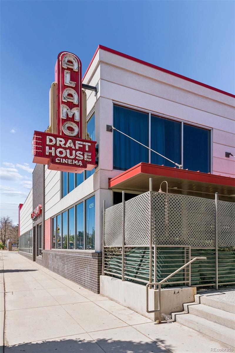 2255 Meade Street Denver, CO 80211 - Photo 29 of 30 a front view of a building with parking space and a street
