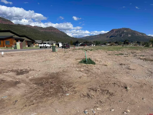 a view of house with mountain view