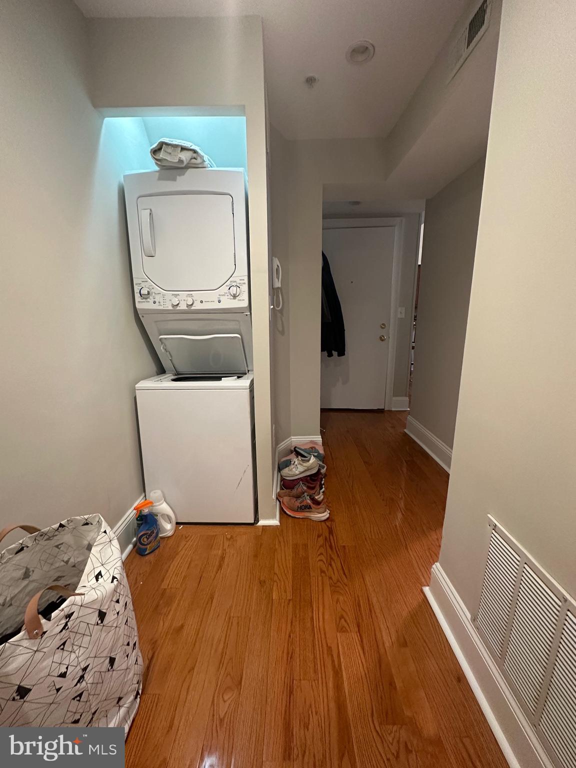1014 Clinton Street, Unit 1R Philadelphia, PA 19107 - Photo 8 of 14 a bedroom with a bed and wooden floor