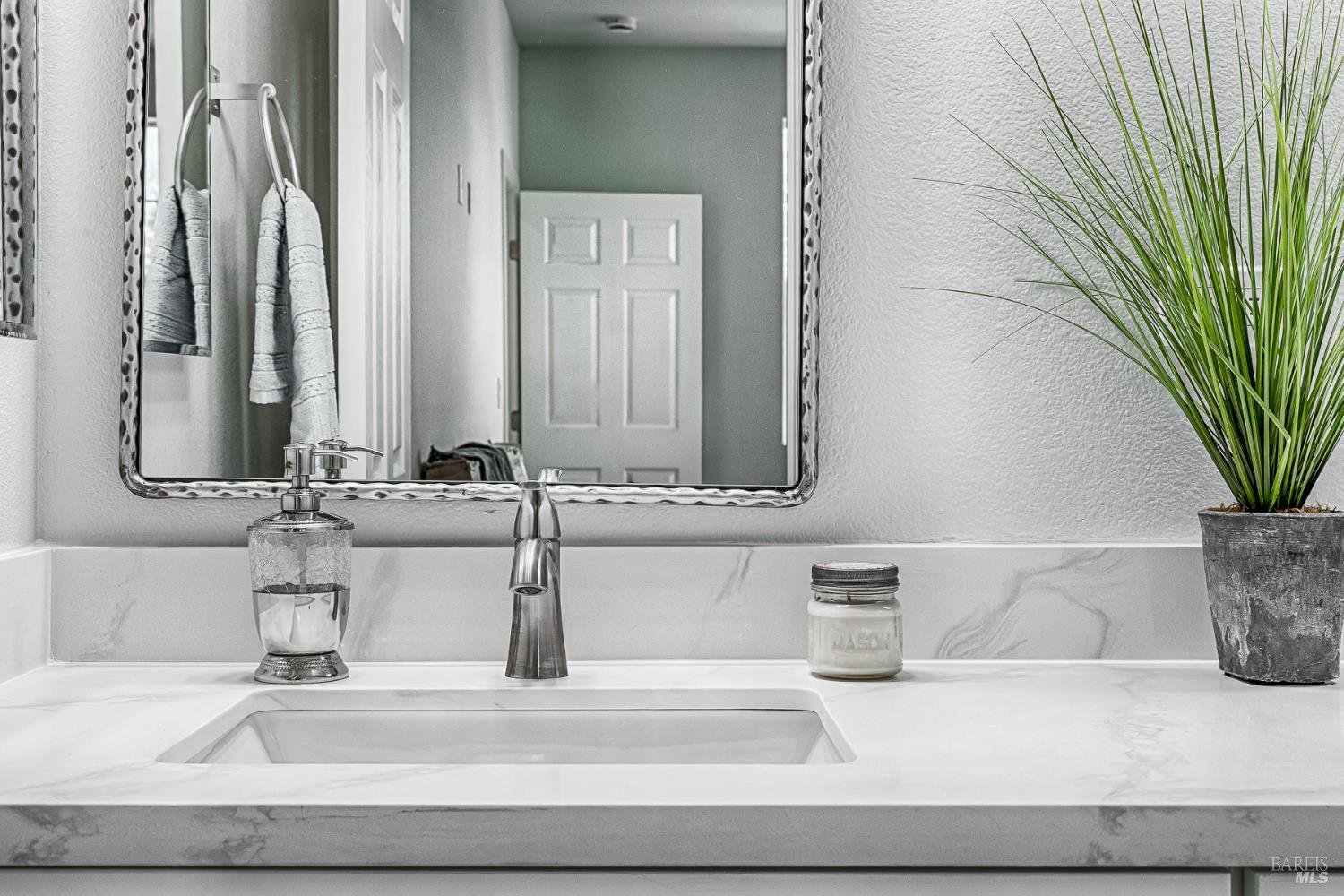 1960 Las Ventanas Drive Santa Rosa, CA 95407 - Photo 28 of 36 a bathroom with a sink and a mirror