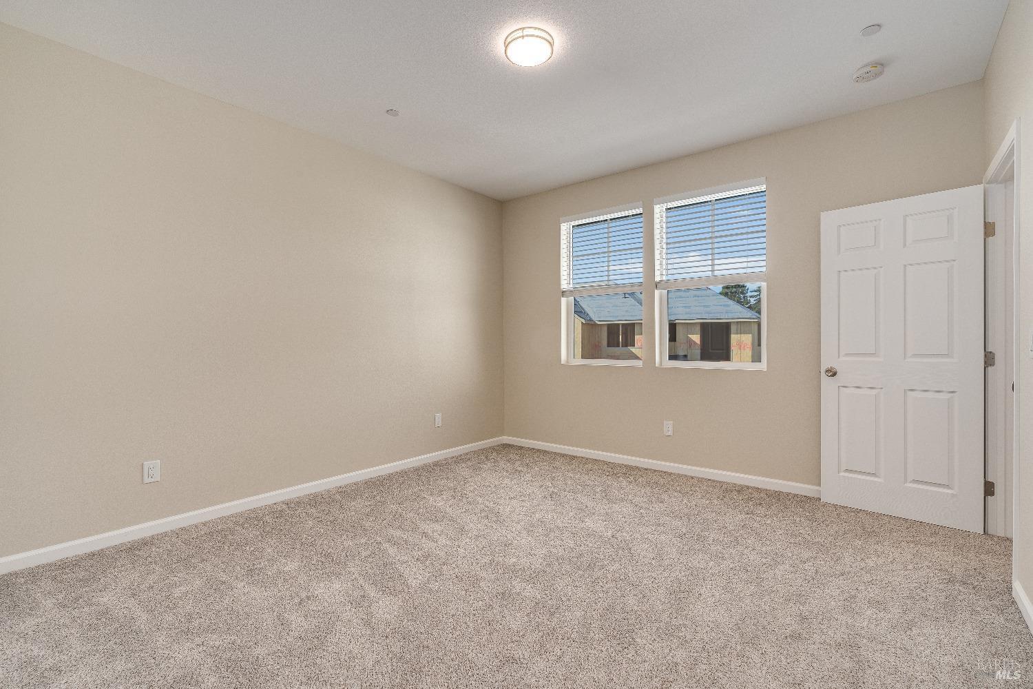 1960 Las Ventanas Drive Santa Rosa, CA 95407 - Photo 5 of 36 an empty room with windows and closet