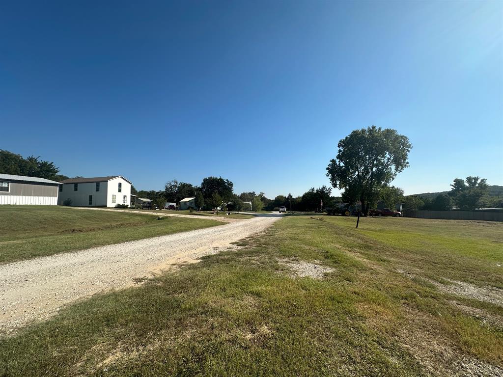 240 1st Street Oak Ridge, TX 76240 - Photo 2 of 7 a view of an ocean and beach