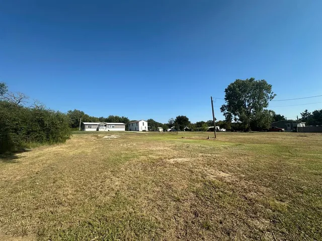 a view of an ocean from a yard