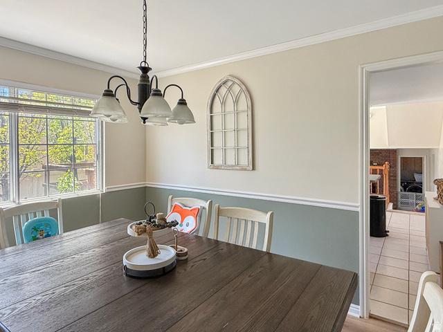 1716 Sagewood Road Price, UT 84501 - Photo 9 of 73 Dining space featuring crown molding and suspended lighting