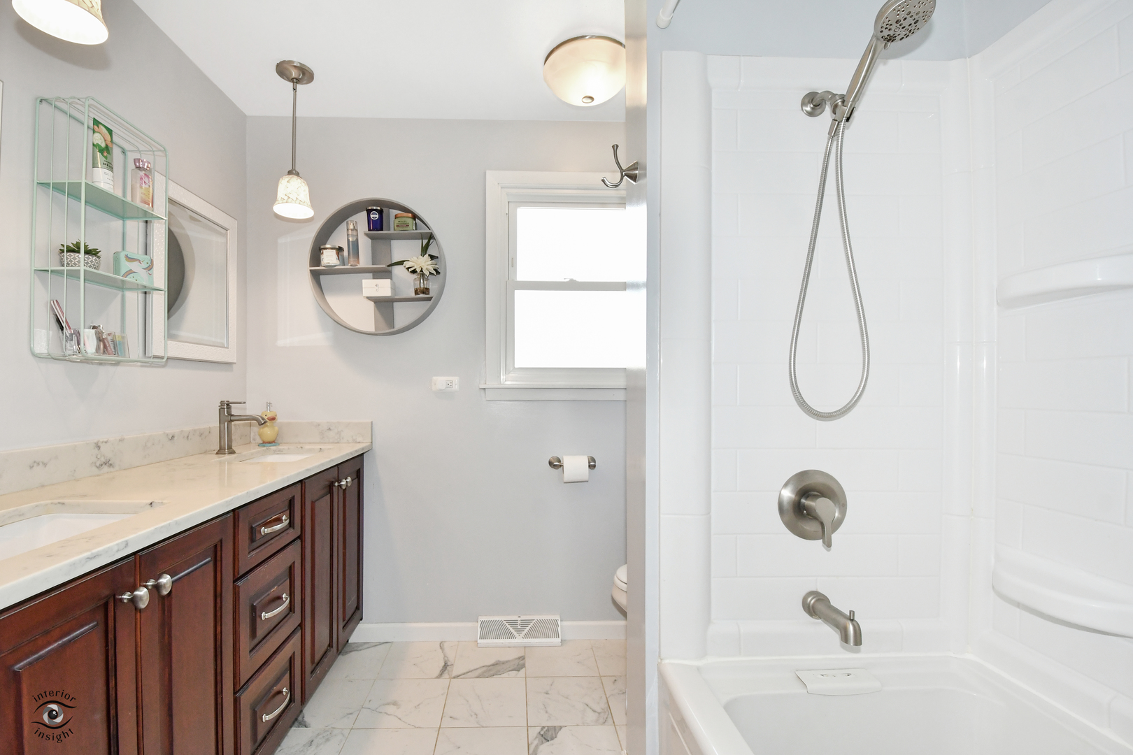 802 Timber Lane Darien, IL 60561 - Photo 14 of 23 a bathroom with a granite countertop sink a toilet and shower