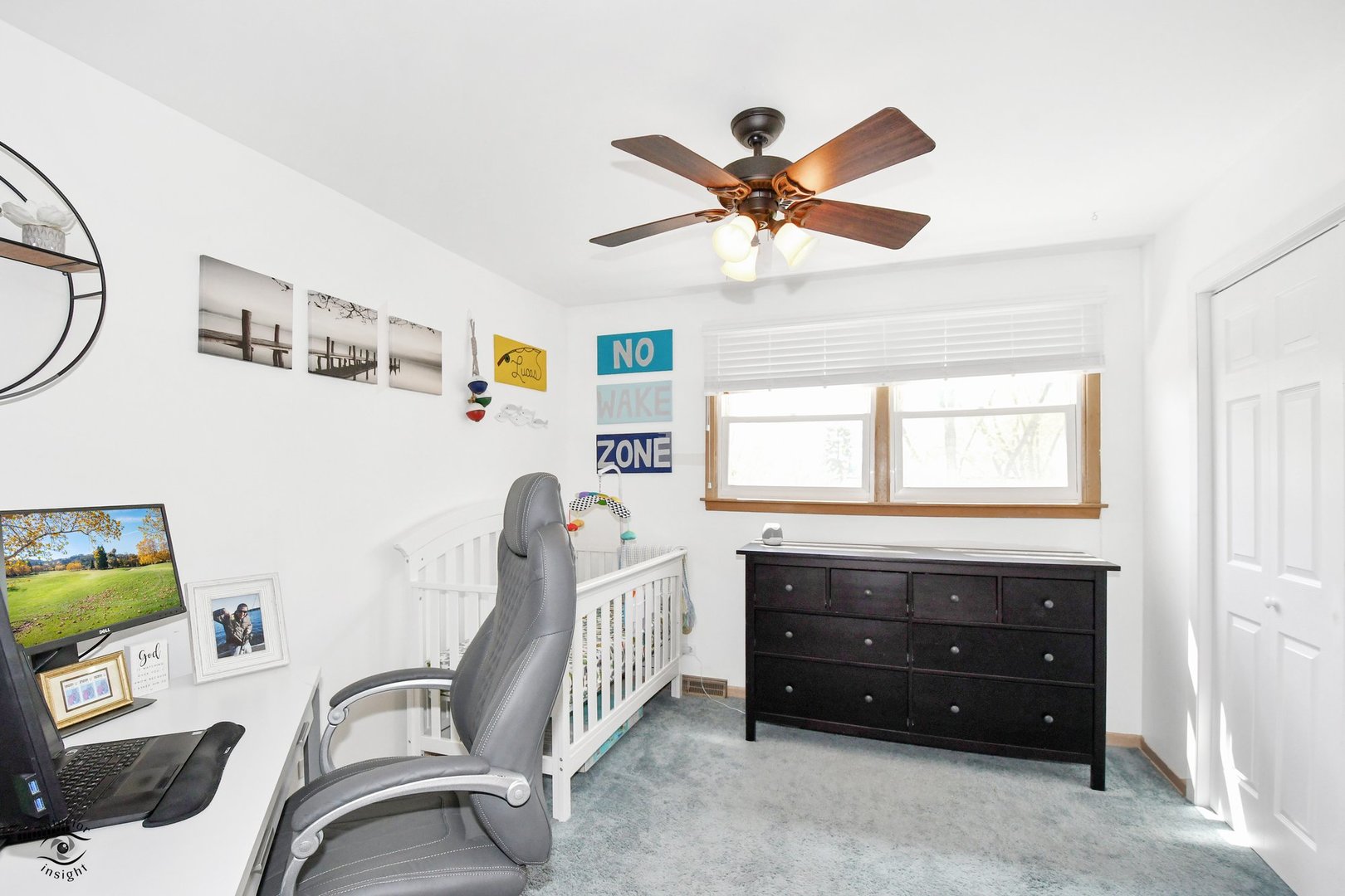 802 Timber Lane Darien, IL 60561 - Photo 16 of 23 a room with a workspace and a window