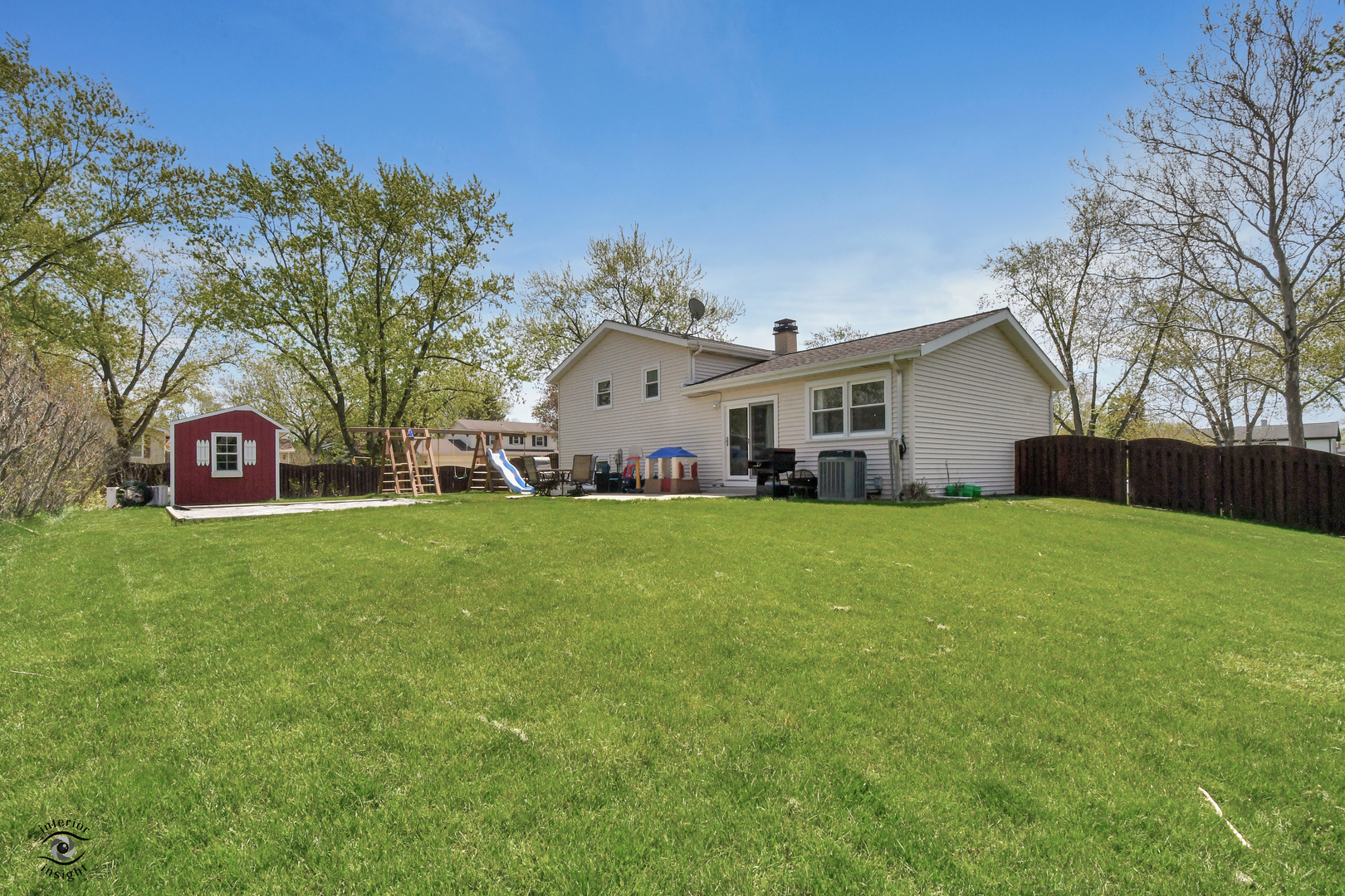 802 Timber Lane Darien, IL 60561 - Photo 21 of 23 a front view of a house with a garden