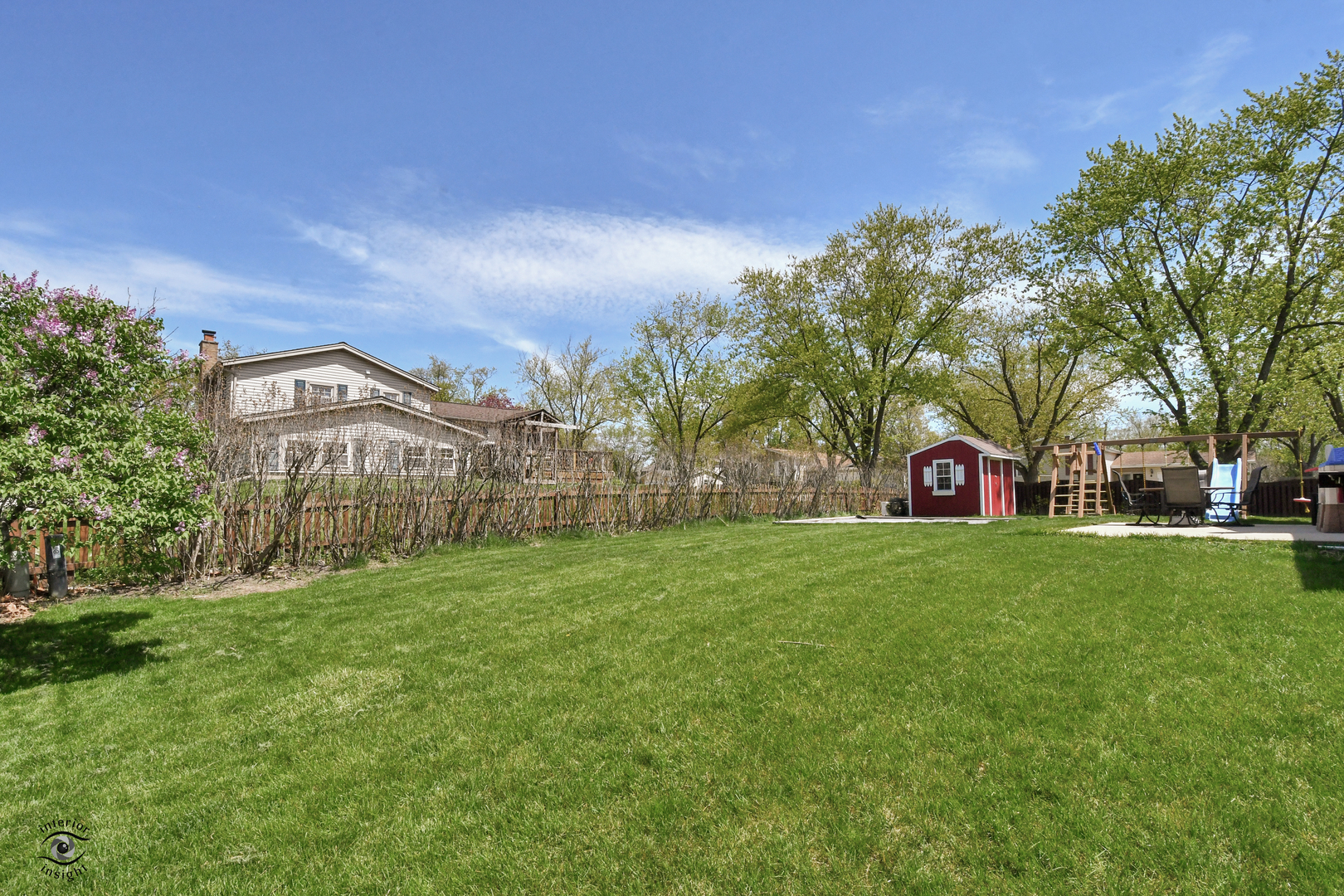 802 Timber Lane Darien, IL 60561 - Photo 23 of 23 a view of a big yard with a house in the background