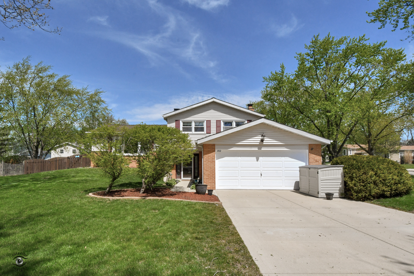 802 Timber Lane Darien, IL 60561 - Photo 3 of 23 a front view of a house with a yard and garage