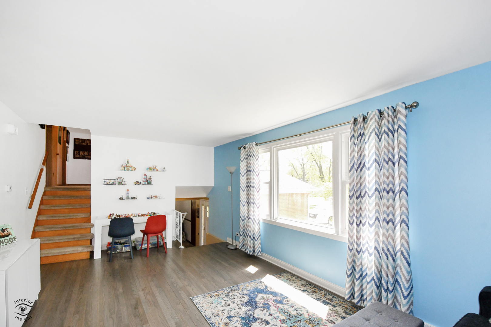 802 Timber Lane Darien, IL 60561 - Photo 5 of 23 a bed room with a bed and a chair