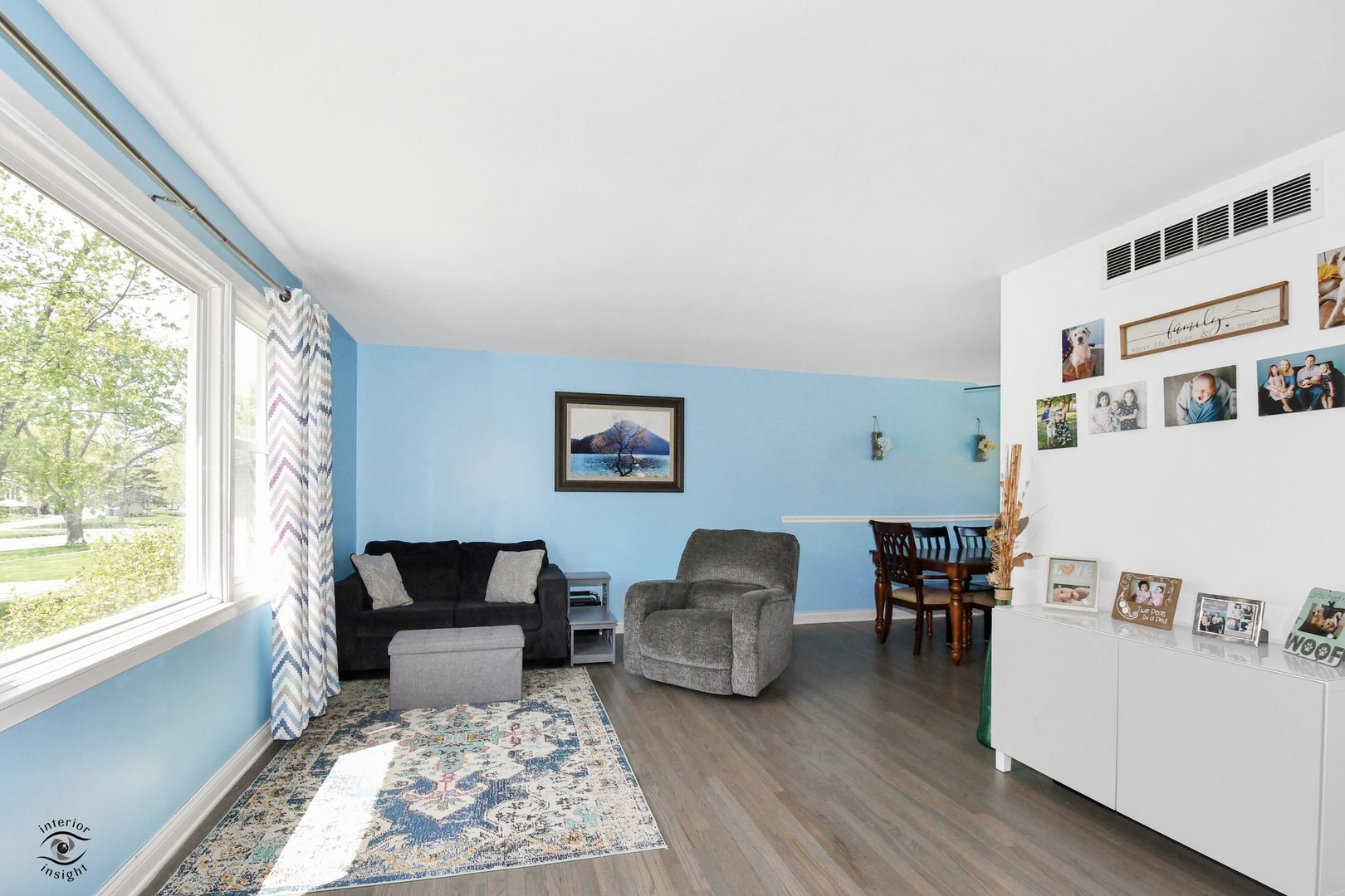 802 Timber Lane Darien, IL 60561 - Photo 6 of 23 a living room with furniture and a window with wooden floor