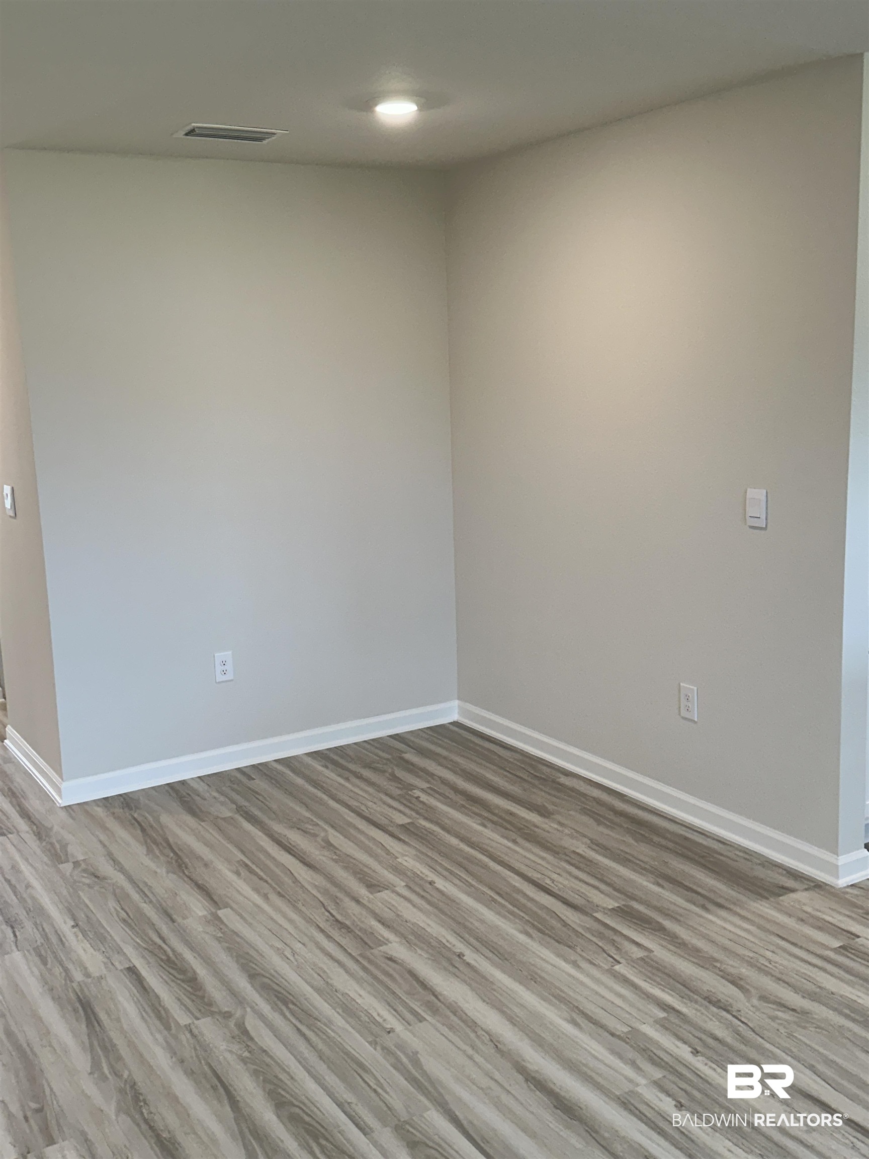 8850 Sea Star Circle Foley, AL 36535 - Photo 23 of 29 Empty room featuring light hardwood / wood-style floors