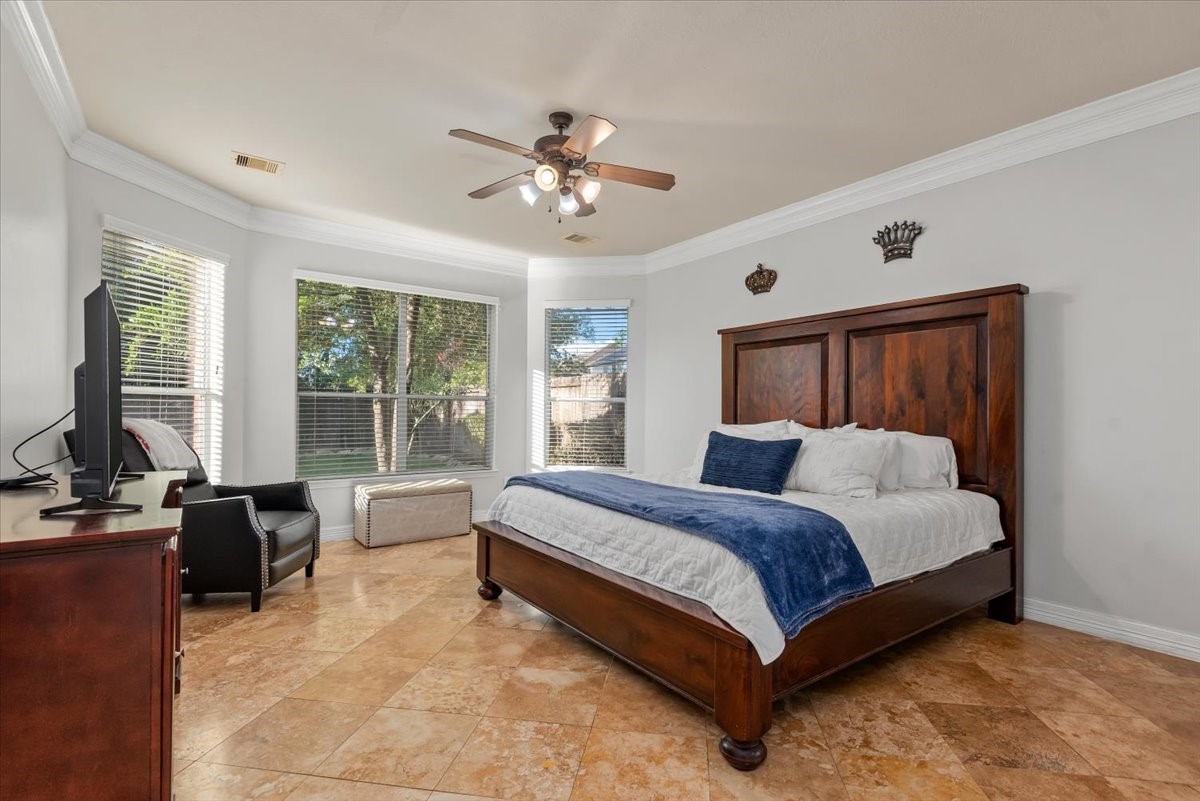 6507 Quiet Pointe Drive Spring, TX 77389 - Photo 14 of 45 This spacious primary features elegant ceramic tile flooring and ample natural light from the big windows. Tons of room to work with.