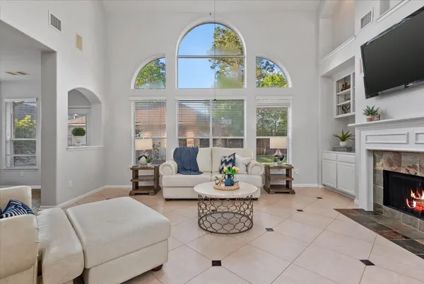 an aerial view of a house with outdoor space
